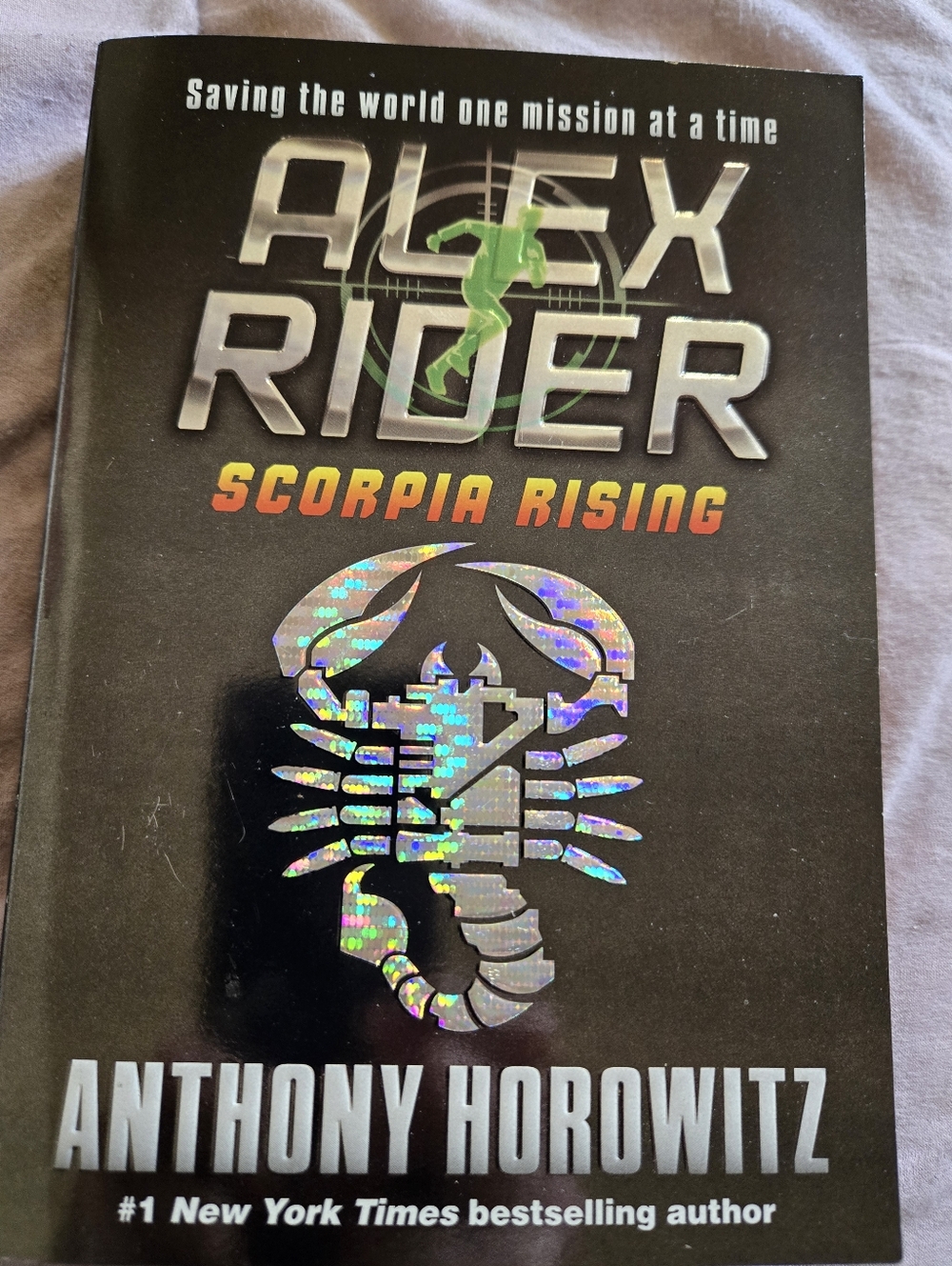 Alex Rider Scorpia Rising Book Cover - Black with Holographic Scorpion